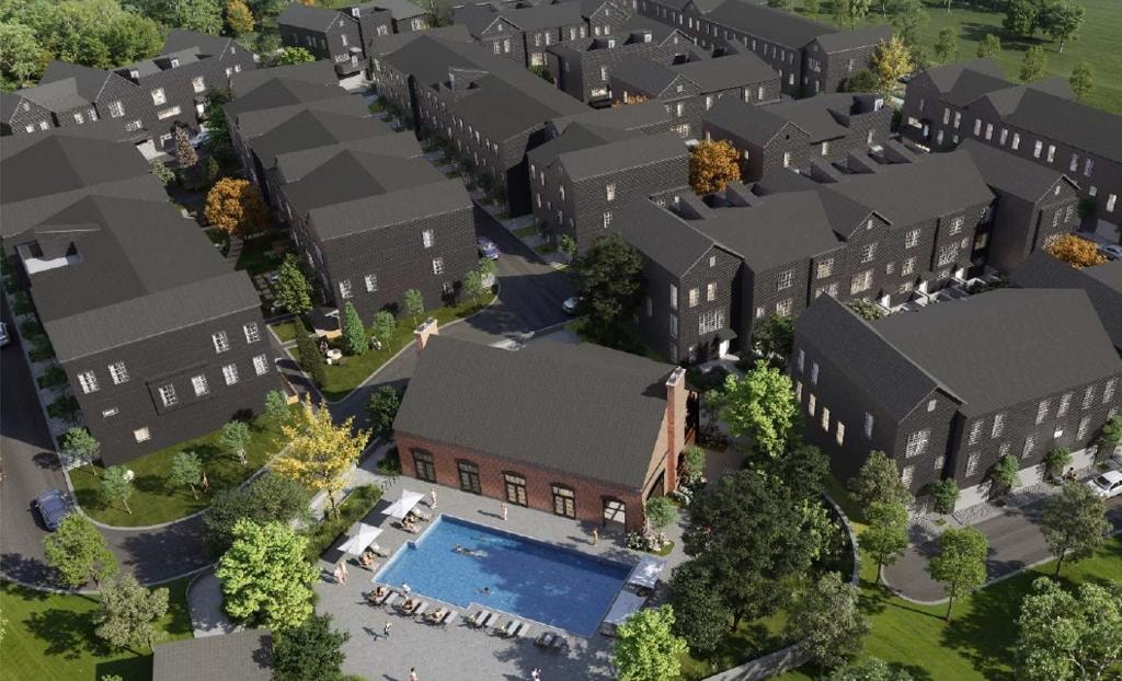 Aerial view of Sablewood townhome community with pool